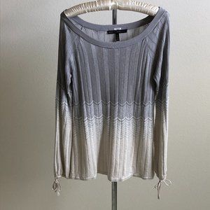 Beautiful silver and gray sweater. Size M